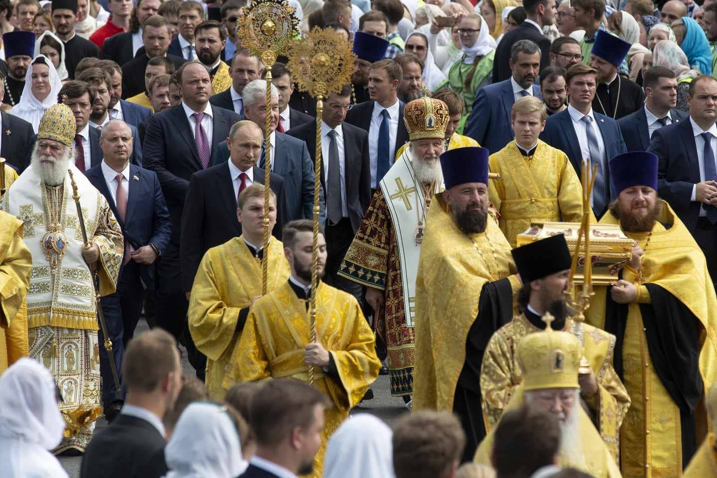 Putin surrounded by Clerics.