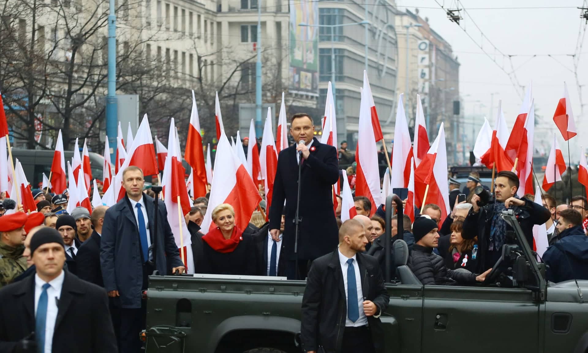 Poland’s president, Andrzej Duda, addresses the crowds before the official start of a march marking the 100th anniversary of Polish independence in Warsaw on 11 November.